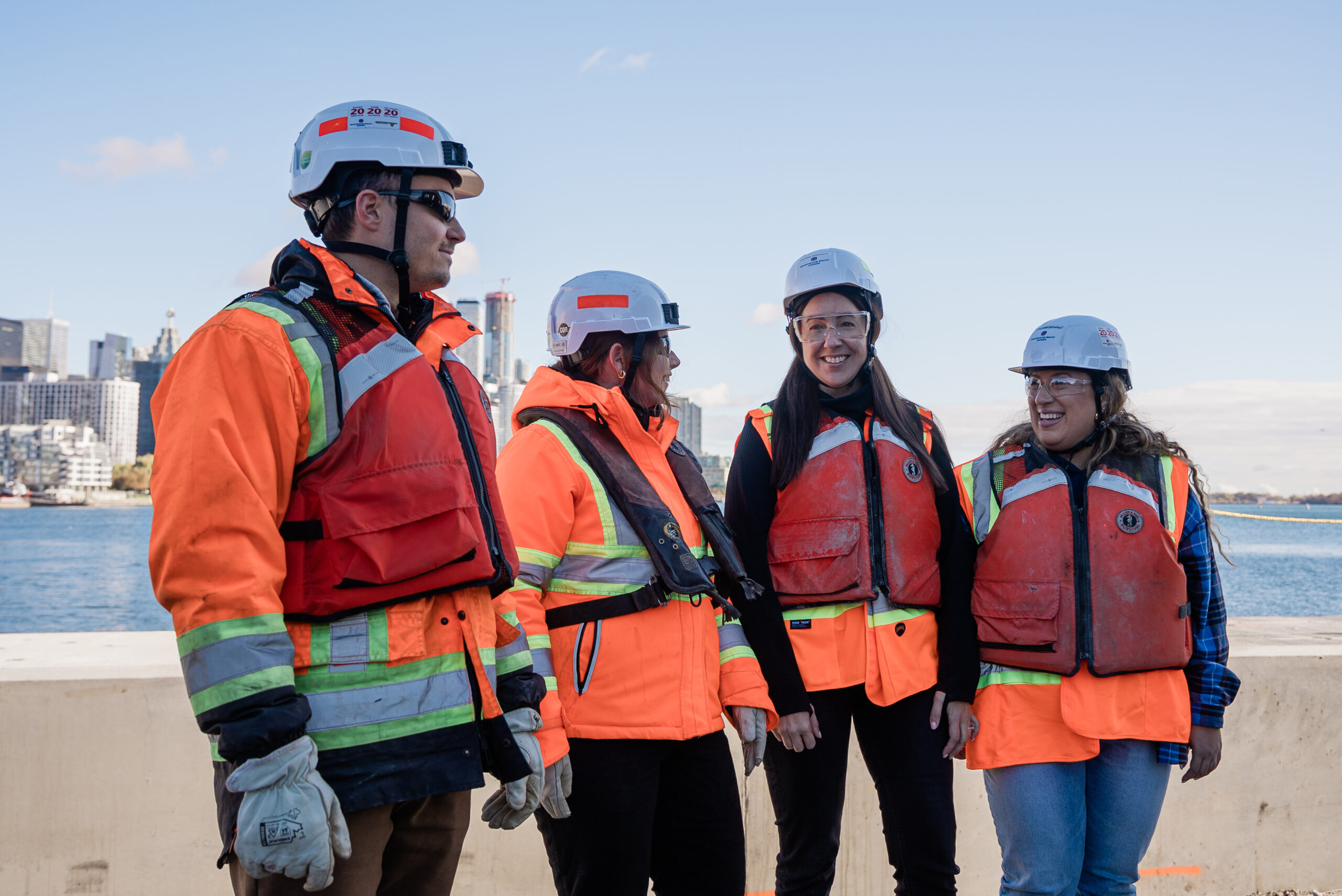 BillyBishop-6 Four workers on the jobsite talking