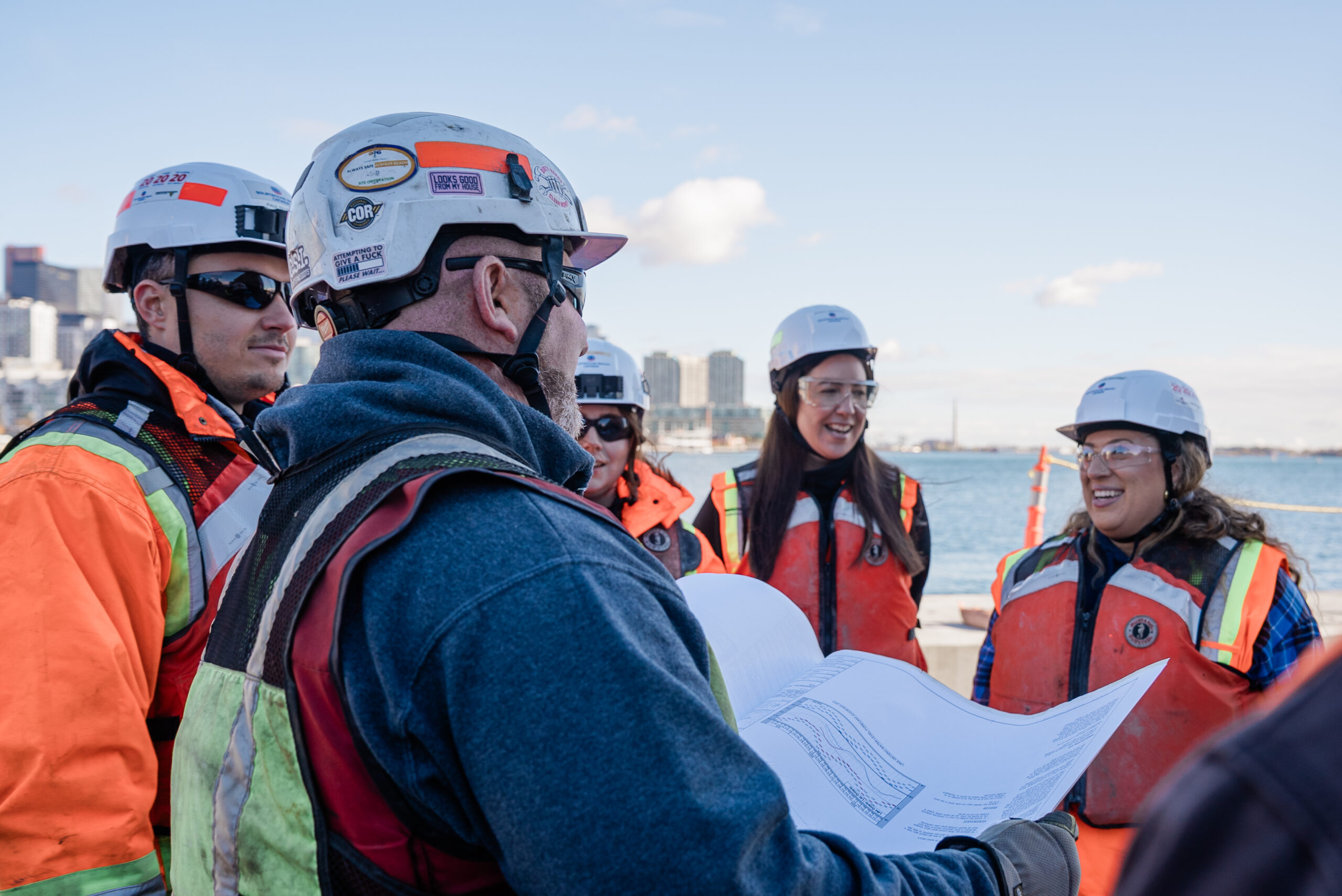 BillyBishop-9 team discussing on the jobsite