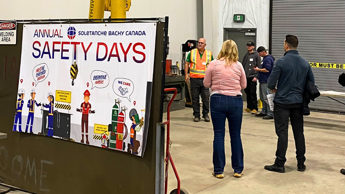 Safety Day 2025 poster and people involved in a workshop